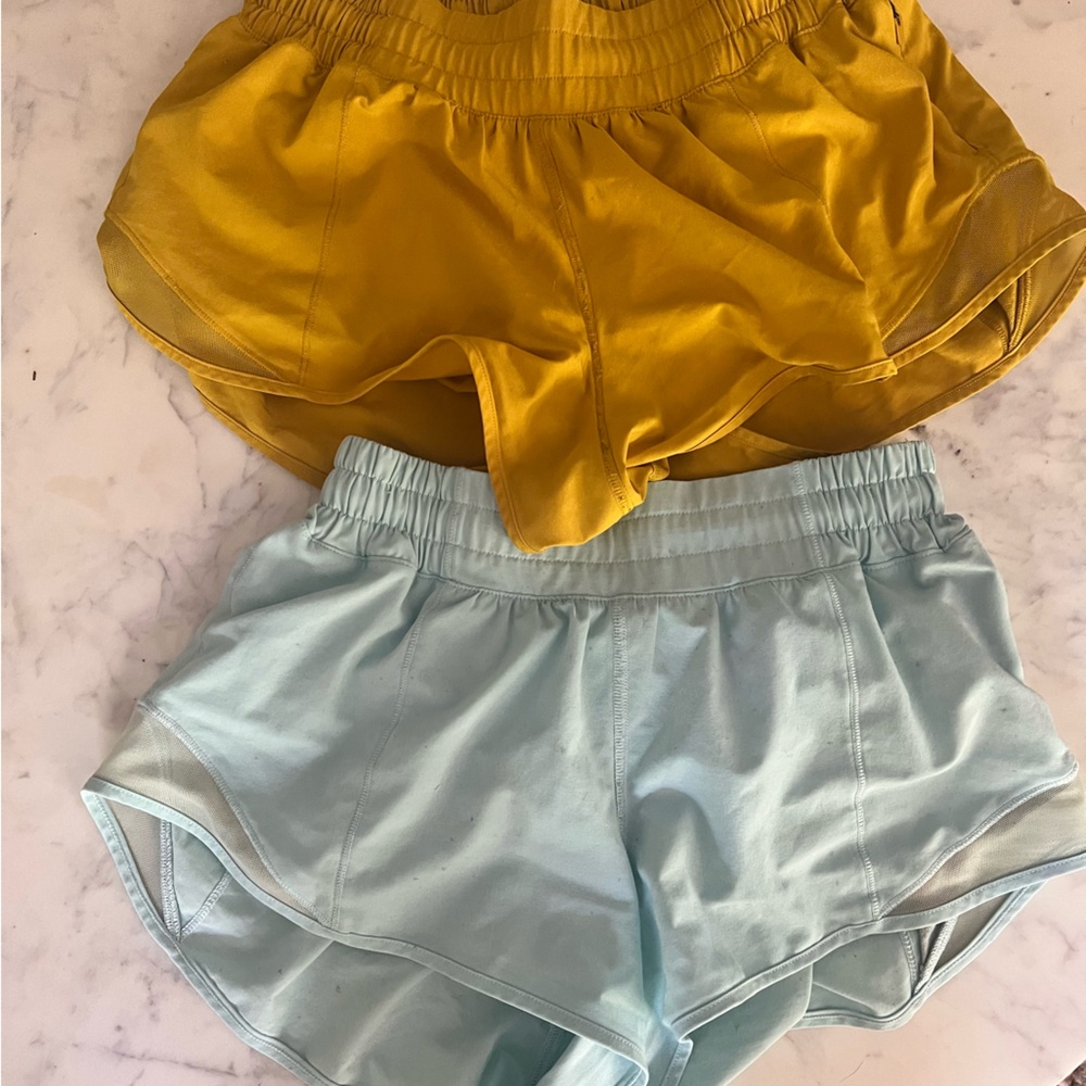 2 pairs of size 4 hotty hot shorts. 2.5 inches